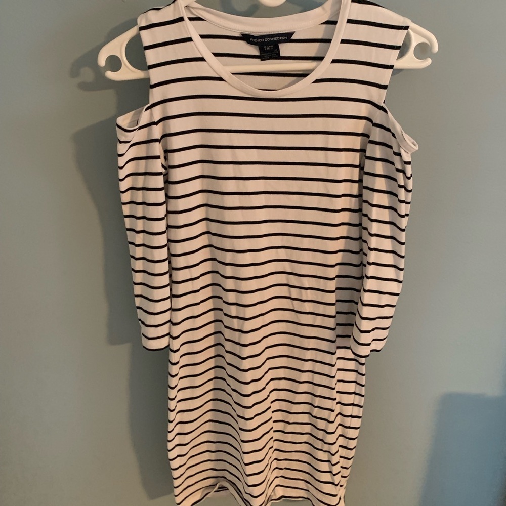 White and black fitted dress.